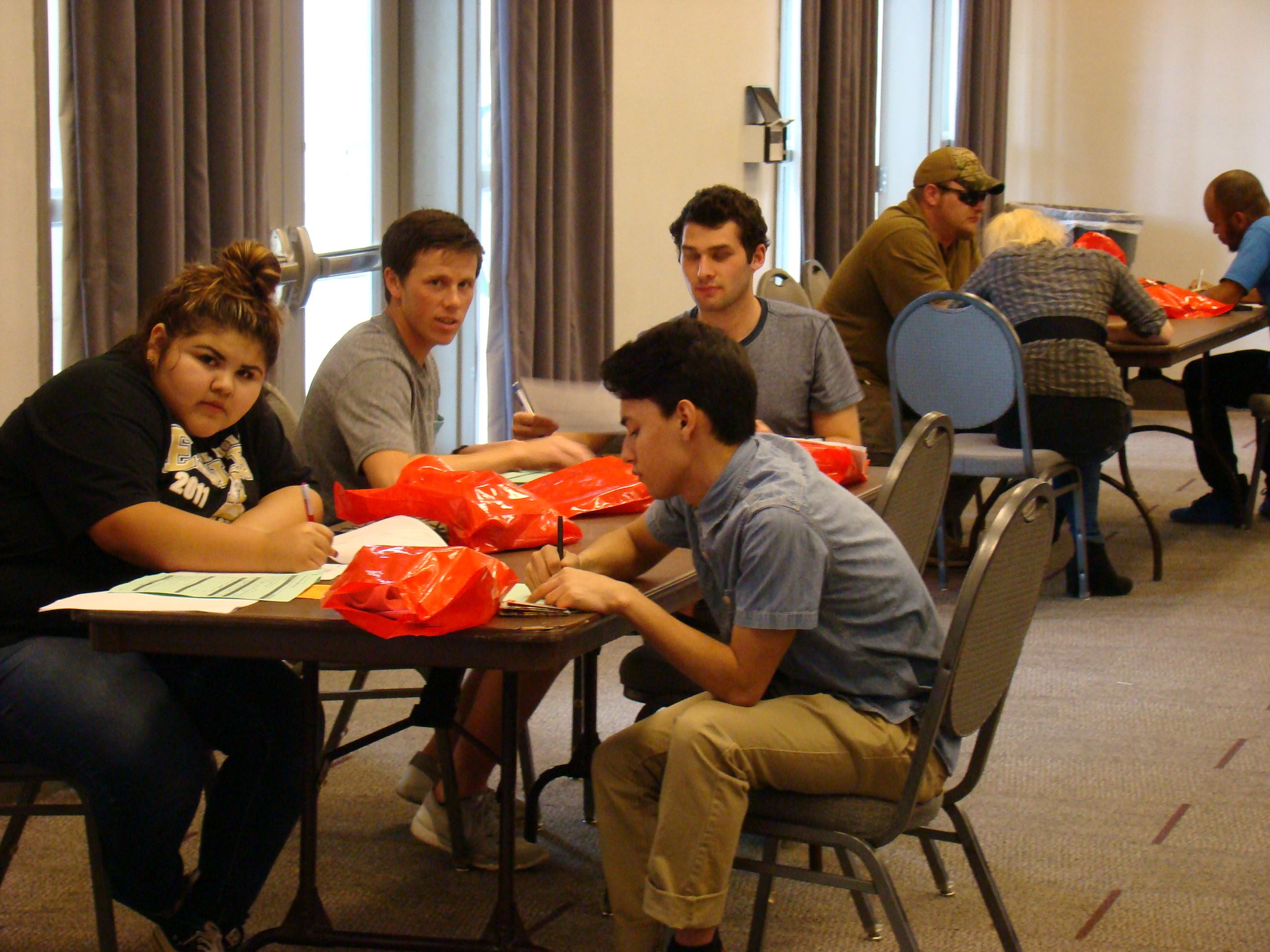 Attendees completing applications